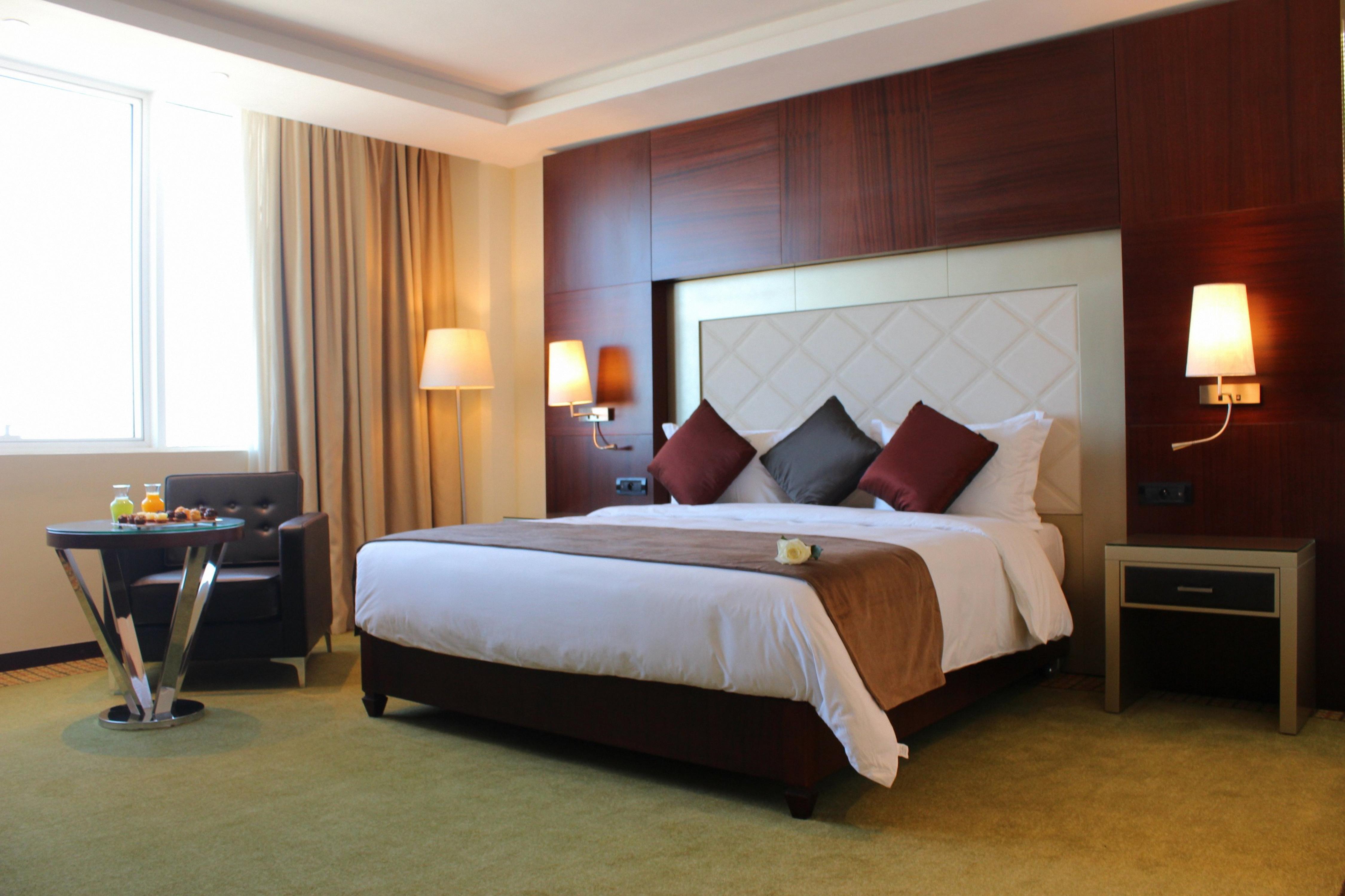 Grand Mogador City Center Casablanca Luaran gambar A bedroom at the hotel