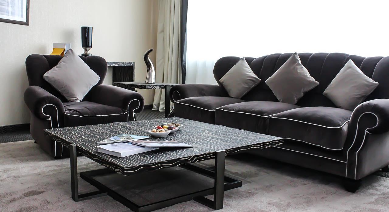 Grand Mogador City Center Casablanca Luaran gambar A living room